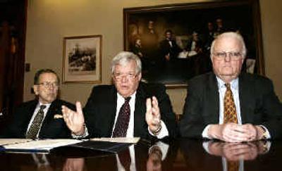 
House Speaker Dennis Hastert of Ill., center, flanked by Senate Commerce Committee Chairman, Sen. Ted Stevens, R-Alaska, left, and House Judiciary Committee Chairman, Rep. James Sensenbrenner, R-Wis., meets reporters on Thursday. 
 (Associated Press / The Spokesman-Review)