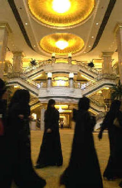 
Women students visit the Emirates Palace hotel.
 (Associated Press / The Spokesman-Review)
