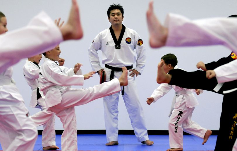 Marshal arts instructor Heungki Kim during class at K Tigers Taekwondo in Coeur d'Alene on Monday, October 27, 2009. KATHY PLONKA kathypl@spokesman.com (Kathy Plonka / The Spokesman-Review)