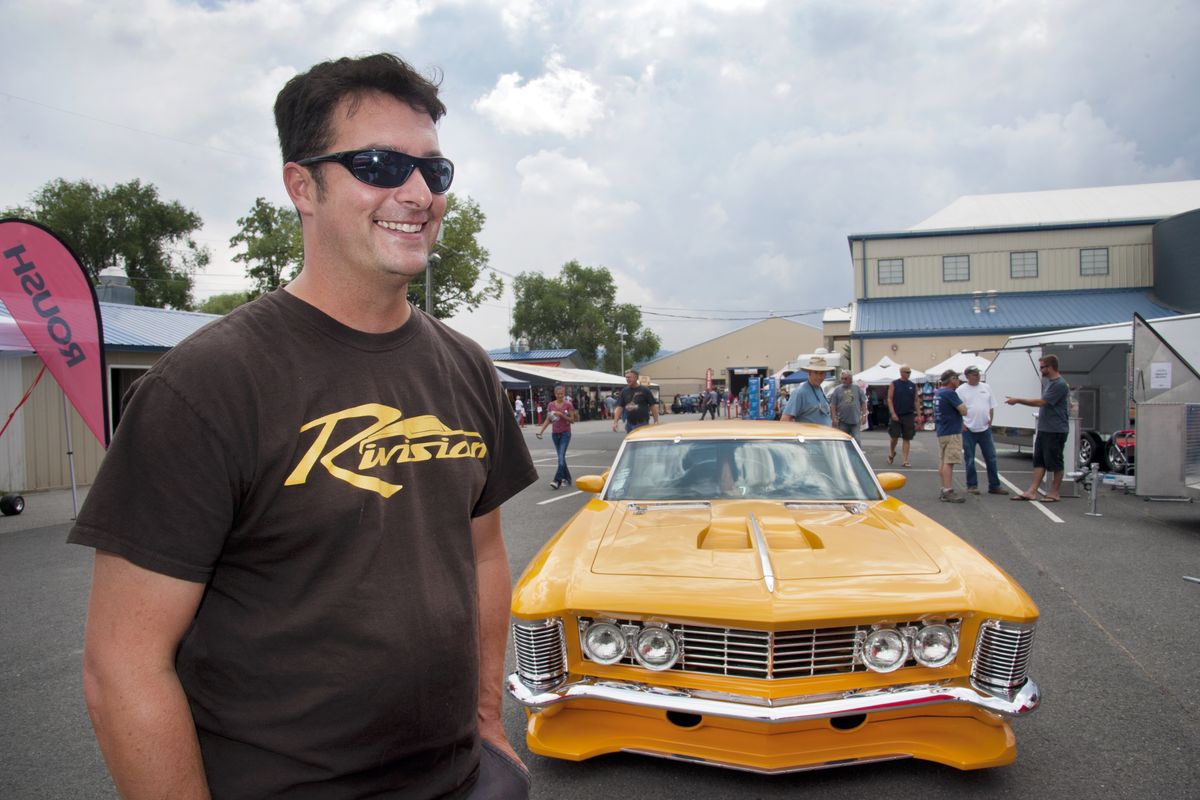 J.F. Launier, of Osoyoos, B.C., created a customized version of a 1964 Buick Riviera. He said he put 20,000 hours of work into the car and painted it “school-bus yellow.” He displays it at the Goodguys Great Northwest Nationals on Saturday at the Spokane County Fair & Expo Center. (Dan Pelle)