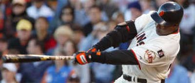 
San Francisco's Barry Bonds hits a fifth-inning double against Arizona on Saturday. Associated Press
 (Associated Press / The Spokesman-Review)