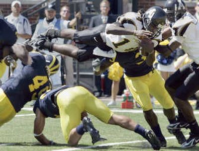 
An airborne Armanti Edwards guided Appalachian State over Michigan during September's big upset. Associated Press
 (Associated Press / The Spokesman-Review)