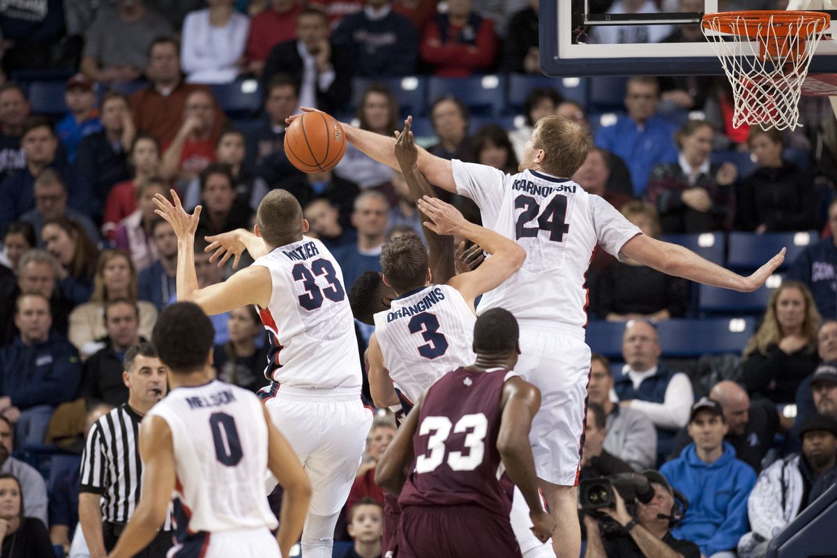 Gonzaga’s Przemek Karnowski and the Zags defense puts a stop to Nevin Johnson (obscured) and Texas Southern on Monday at the McCarthey Athletic Center. (Dan Pelle)