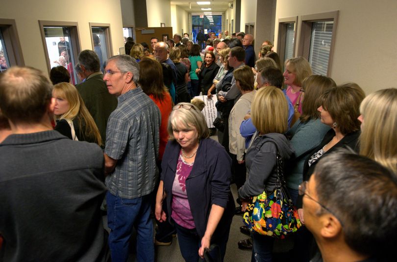 With a crowd spilling into the hallway, hundreds of citizens showed up at Tuesday’s Spokane Valley City Council meeting to voice their concern about the XXXtreme Espresso stand on Sprague Avenue near Pines Road. (Colin Mulvany)