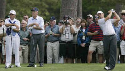 
Ryan Moore, right, has enjoyed his reign as U.S. Amateur champion; playing the Masters with Phil Mickelson, and a practice round with Gary Player, left, and Jack Nicklaus. 
 (File/Associated Press / The Spokesman-Review)