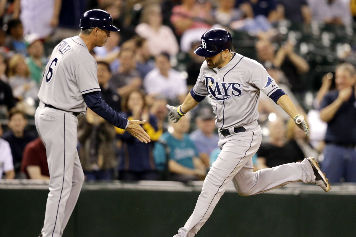 Rays’ David DeJesus rounds bases after 9th-inning homer. (Associated Press)