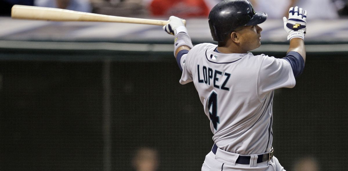 M’s Jose Lopez hits a two-run home run in the fourth.  (Associated Press / The Spokesman-Review)
