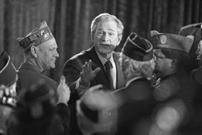 
President Bush greets veterans after speaking about Iraq war  funding Tuesday in Fairfax, Va. 
 (Associated Press / The Spokesman-Review)