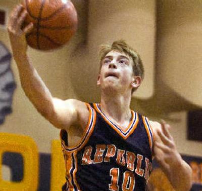 
Zach Gianukakis, center, is making his third state appearance for Republic and averages a team-high 23.6 points a game. 
 (CHRISTOPHER ANDERSON / The Spokesman-Review)
