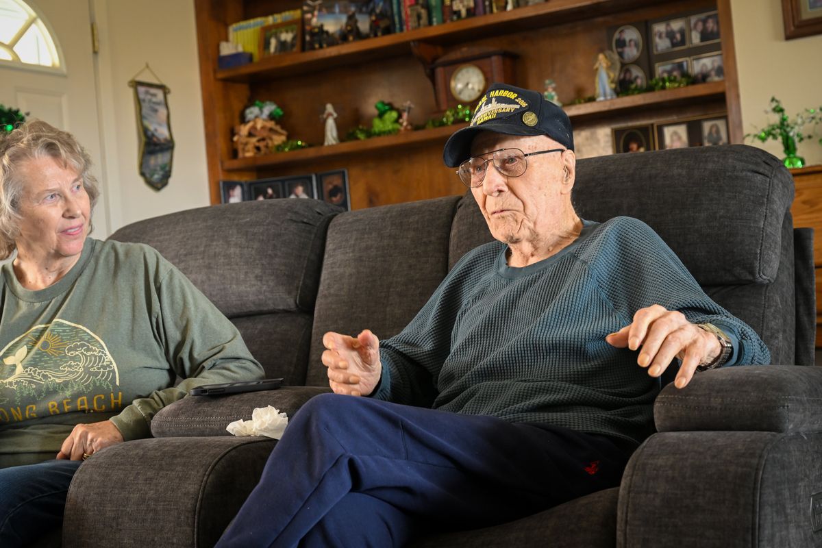 Gebard “Geb” Galle, right, a 104-year-old Pearl Harbor survivor, sits with his daughter Lynda Palmer on March 12 in Moses Lake. When his pension benefits stopped coming recently, Palmer reached out to local media to try and get the federal government to reinstate his pension. (Jesse Tinsley/THE SPOKESMAN-REVIEW)
