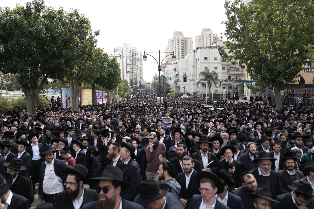 Ultra-Orthodox Jews attend the funeral of Rabbi Chaim Kanievsky in Bnei Brak, Israel, on Sunday.  (Oded Balilty)