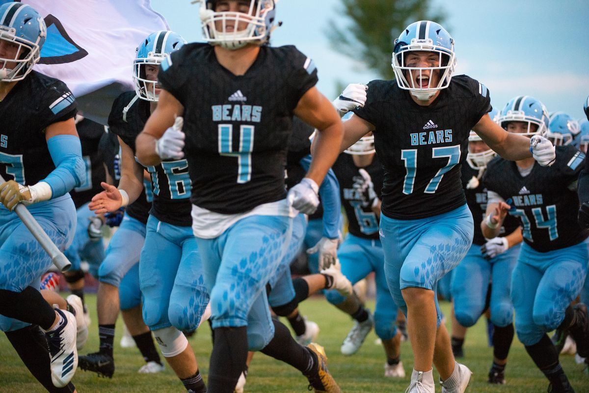 The Central Valley Bears charge the field preceding a home game against Lewis and Clark High School on Sept. 14, 2018 at Central Valley High School in Spokane Valley, Wash. The LC Tigers took the game 41-39. (Libby Kamrowski / The Spokesman-Review)