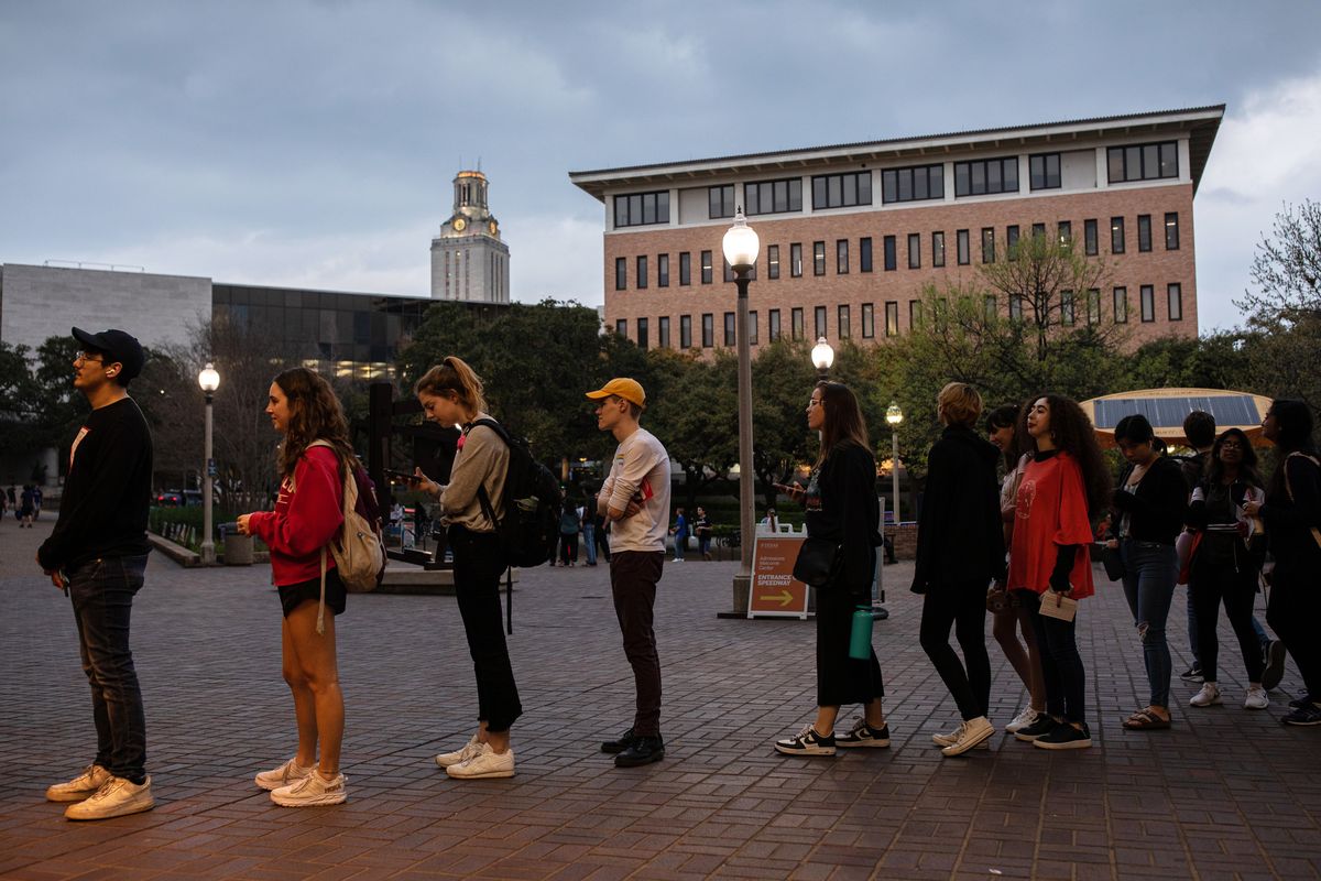 FILE -- Super Tuesday voters wait in line outside a polling place on the University of Texas at Austin campus, on March 3, 2020. GOP bills in some states would create obstacles for young people to vote. (Tamir Kalifa/The New York Times)  (TAMIR KALIFA)