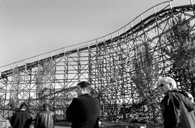 
Paul Norton, left, walks with his father, Gary Norton, owner of Silverwood Theme Park on Tuesday after a groundbreaking ceremony for a new ride that boasts a 120-foot vertical drop at 47mph. 
 (Kathy Plonka / The Spokesman-Review)