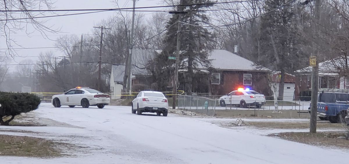 Indianapolis Metropolitan Police Department work the scene Sunday, Jan. 24, 2021 in Indianapolis where five people, including a pregnant woman, were shot to death early Sunday inside an Indianapolis home. Th pregnant woman who was taken to an area hospital, both she and the unborn child died despite life-saving efforts.  (Justin L. Mack)