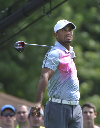 Bridgestone Invitational defending champion Tiger Woods shot a 68 on Thursday in the first round of the WGC event at Firestone. (Associated Press)