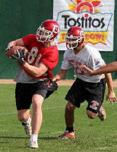 
Wide receiver Brad Clifford, left, is one of Utah's big-play players. 
 (Associated Press / The Spokesman-Review)