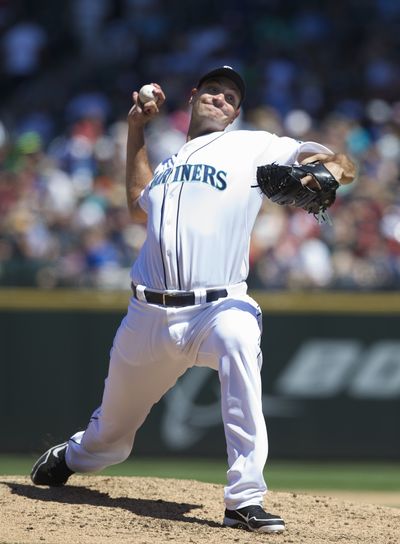 Chris Young won 12 games for the Mariners in 2014. (Associated Press)