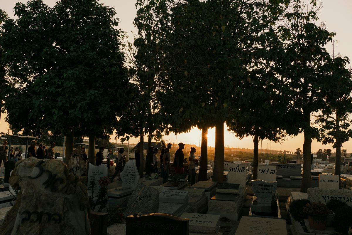 Mourners leave the funeral of Kim Demati, 22, in Gadara, Israel, on Thursday. She was killed at the site of a music festival near the border fence with Gaza during an attack by Hamas militants.  (Lorenzo Tugnoli/For the Washington Post)