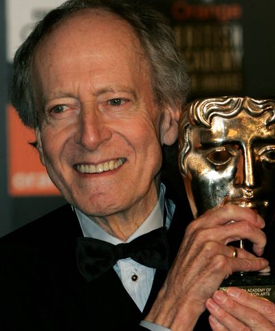 Composer John Barry  holds his Academy Fellowship award at the British Academy Film Awards in London’s Leicester Square Feb. 12, 2005.  (Associated Press)