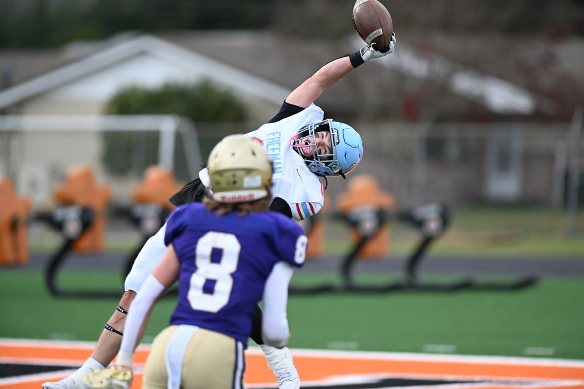 Freeman receiver Nash McLean makes a one-handed catch against Onalaska in a State 2B quarterfinal at Tiger Stadium in Centralia on Nov. 23, 2024.   (Lane Mathews/courtesy)