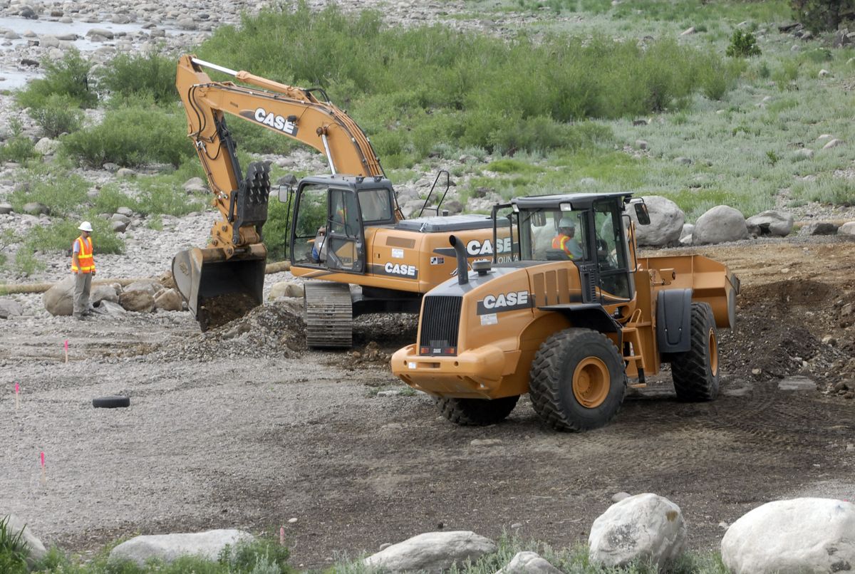 Contaminated dirt from the north bank of the Spokane River near Harvard Road is being removed by Able Cleanup Technologies and will be disposed at the Graham Road Landfill.  (J. BART RAYNIAK / The Spokesman-Review)