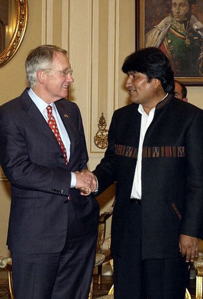 
Bolivian President Evo Morales, right, greets U.S. Sen.  Harry Reid, D. Nev., in La Paz on Tuesday. 
 (Associated Press / The Spokesman-Review)
