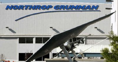 
The Northrop Grumman plant in El Segundo, Calif., with models of the B1-B stealth bomber, foreground, and the F/A-18 Hornet fighter jet behind it. Northrop Grumman Corp., the world's largest shipbuilder and the country's third-largest military contractor, says second-quarter earnings rose 17 percent. 
 (Associated Press / The Spokesman-Review)