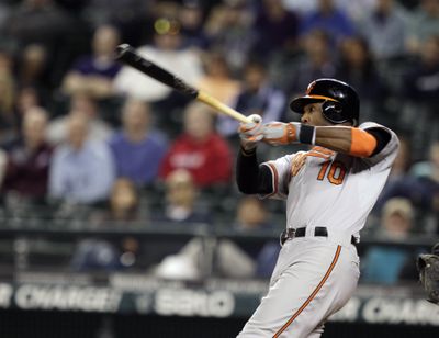 Adam Jones hits a two-run homer in the 11th inning Wednesday to give Baltimore a 3-1 win over the Seattle Mariners. (Associated Press)