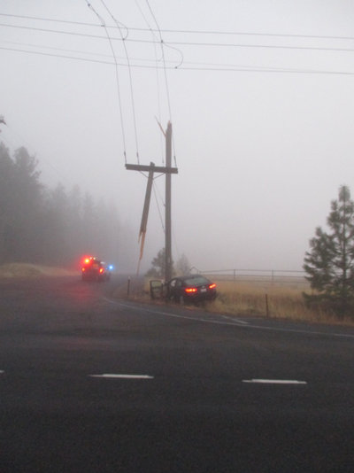 Highway 2 is blocked and hundreds are without power after a car crashed into a power pole near Brooks Road Thursday, Oct. 26 2017. (WSP / Courtesy photo)