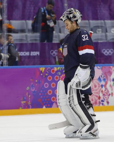 USA goalie Jonathan Quick skates off the ice after Finland beat USA 5-0 in the men's bronze-medal ice hockey game at Winter Olympics. (Associated Press)