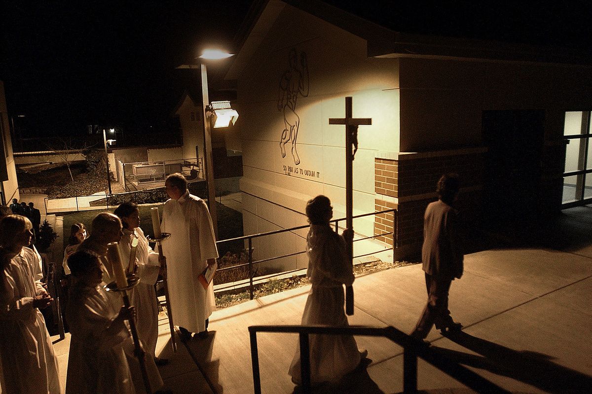 Clergy lead parishioners of Our Lady of Fatima Church into their new house of worship in this picture from 2005. (BRIAN PLONKA)
