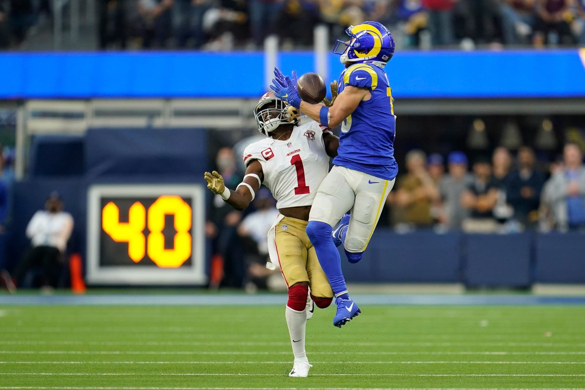 Los Angeles Rams wide receiver Cooper Kupp catches a pass against San Francisco 49ers free safety Jimmie Ward during the second half of a game on Jan. 9 in Inglewood, Calif.  (Marcio Jose Sanchez/Associated Press)