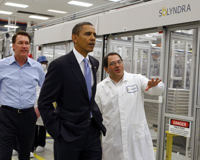 In this May 2010 file photo, President Barack Obama is given a tour of Solyndra Inc. in Fremont, Calif., by Executive Vice President Ben Bierman, right, and Chief Executive Officer Chris Gronet. (Associated Press)