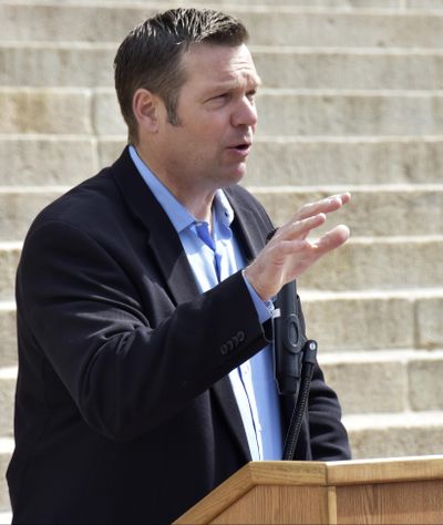 In this Friday, April 20, 2018 photo, Kansas Secretary of State Kris Kobach speaks during a rally at the Statehouse in Topeka, Kan. (Mitchell Willetts / Associated Press)