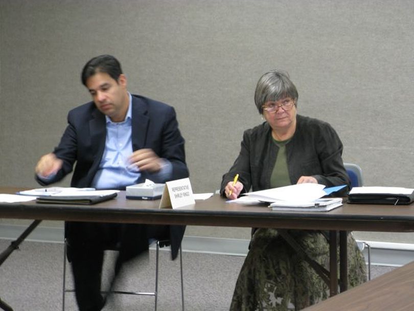 Rep. Shirley Ringo, D-Moscow, right, said she'd like to hear more about the possibility of funding the Idaho State Police through a $1-a-month surcharge on car insurance, which would raise $19 million a year. At left is Rep. Raul Labrador, R-Eagle. (Betsy Russell / The Spokesman-Review)