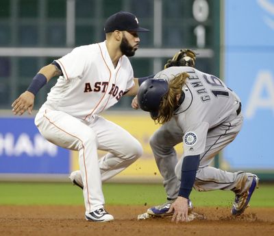 Seattle Mariners’ Ben Gamel steals second base against Houston Astros' Marwin Gonzalez during the fifth inning of a baseball game Monday, July 17, 2017, in Houston. (Melissa Phillip / Associated Press)