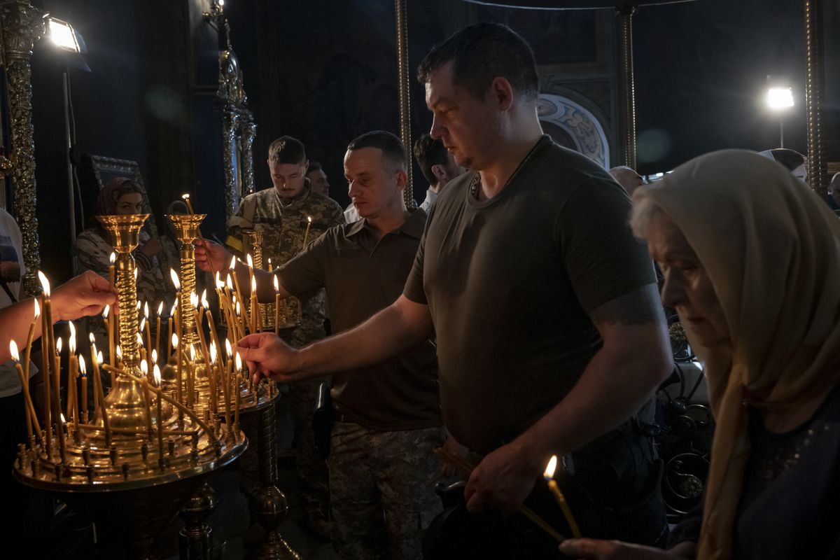 Worshippers pray in St. Volodymyr