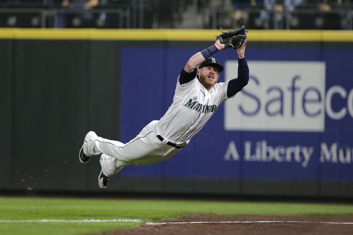 Seattle Mariners right fielder Ben Gamel leaps to make the catch on a ball hit by Baltimore Orioles