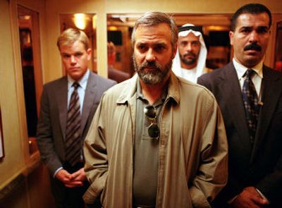 
George Clooney, center, plays a CIA operative who begins to uncover the disturbing truth about the work he has devoted his life to in 