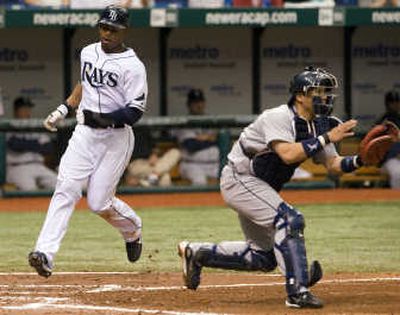 
Tampa Bay's Carl Crawford scores on a seventh-inning double. Associated Press
 (Associated Press / The Spokesman-Review)