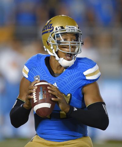 Brett Hundley passed for three touchdowns in UCLA’s 42-35 win over Memphis. (Associated Press)