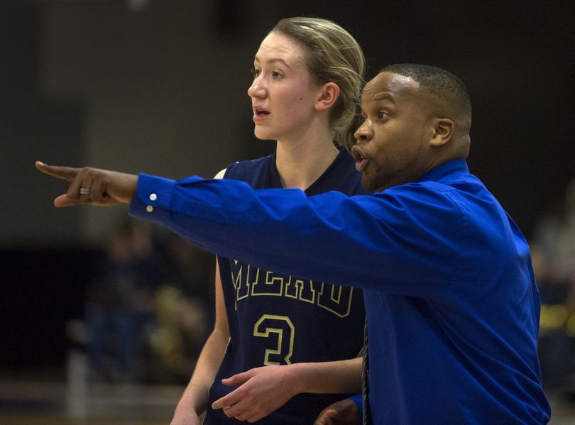 Mead coach Quantae Anderson, offering advice to sophomore Sue Winger, believes in giving his players offensive freedom. (Colin Mulvany)