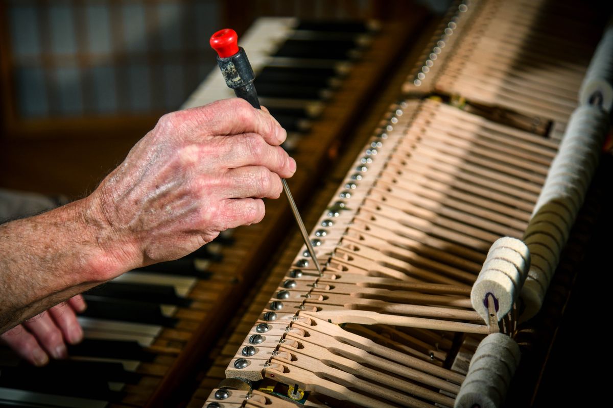 Spokane piano restorer Ken Eschete will soon restore Eleanor Roosevelt’s Steinway, one of many famous, historical pianos he’s brought back to life. Here he demonstrates the hammer drop adjustment on his 1923 Steinway in his north Spokane home on Wednesday.  (Dan Pelle/The Spokesman-Review)