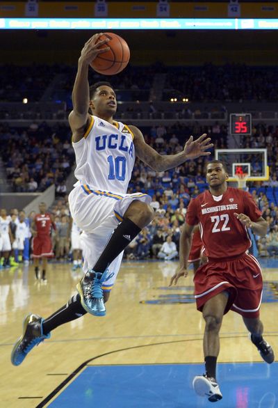 UCLA guard Larry Drew II (10) puts up a lay-in. (Associated Press)