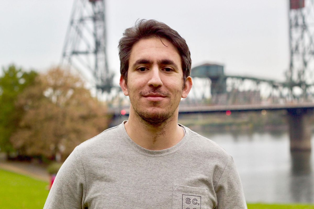 Portland comedian Mohanad Elshieky is shown in this photograph at Tom McCall Waterfront Park in Portland. He said he felt dehumanized by Customs and Border Protection agents who boarded his Greyhound bus in Spokane and demanded to see documentation proving he was in the country legally. (Eder Campuzano / The Oregonian/OregonLive)