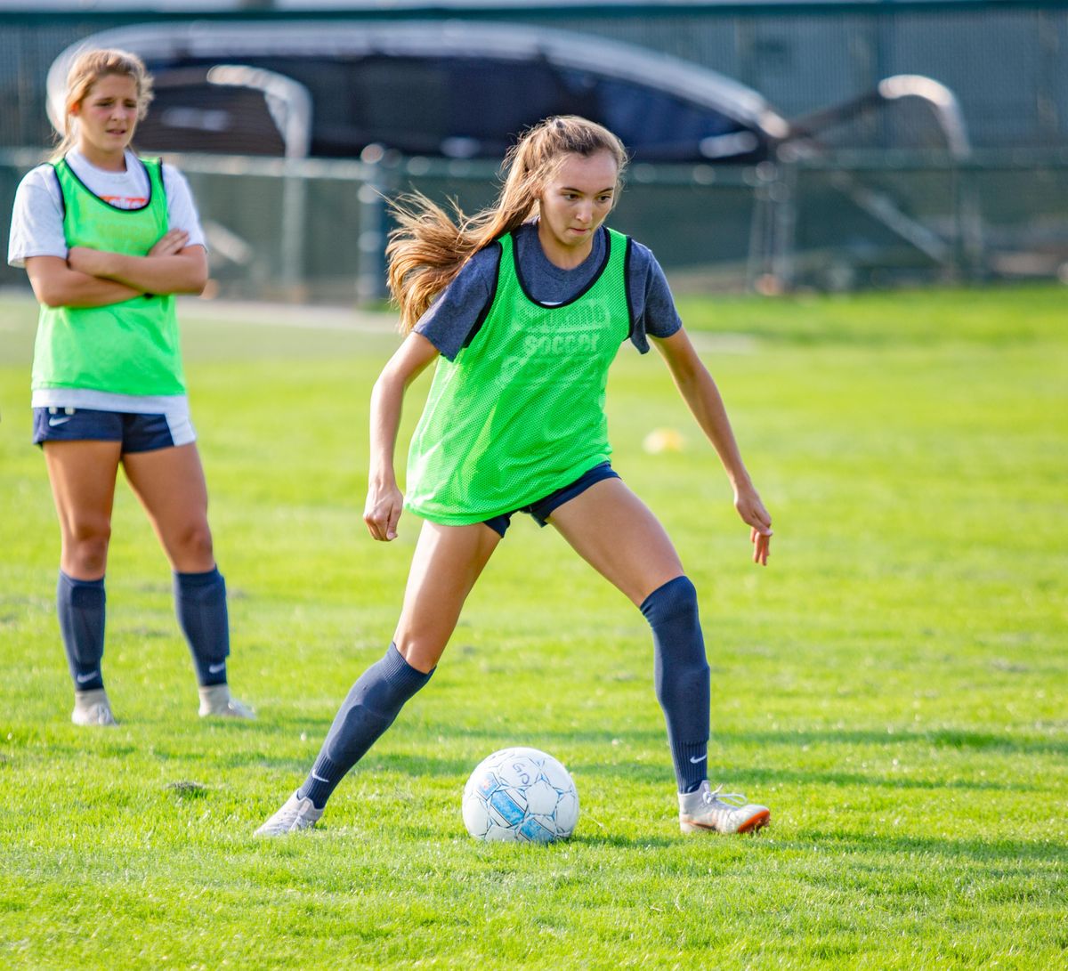 Chelsea Le  dribbles the ball during a drill on  Tuesday during a Gonzaga Prep varsity soccer practice. Le is a midfielder on the team. (Libby Kamrowski / The Spokesman-Review)