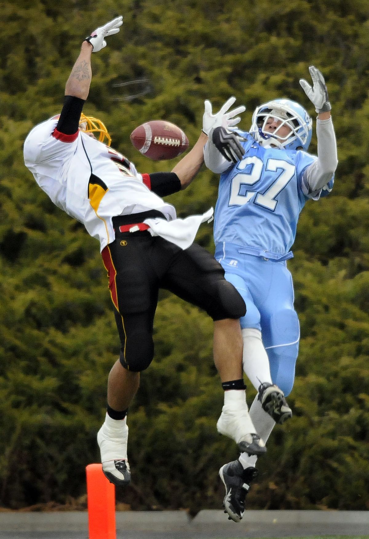 CV’s Cameron Allen, right, and Kamiakin’s Tim White battle for a pass in the end zone. (Dan Pelle / The Spokesman-Review)