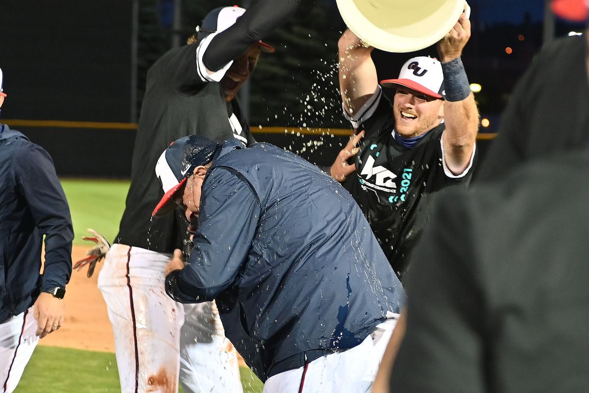 Gonzaga head coach Mark Machtolf, center, is dosed in Gatorade after a 10-0 win over San Diego after a WCC baseball game Thursday, May 27, 2021 at Coach Steve Hertz Field in Spokane WA.  (James Snook For The Spokesman-Review)