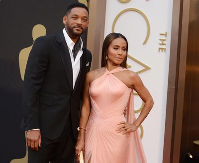 Will Smith, left, and Jada Pinkett Smith arrive March 2, 2014, at the Oscars at the Dolby Theatre in Los Angeles.